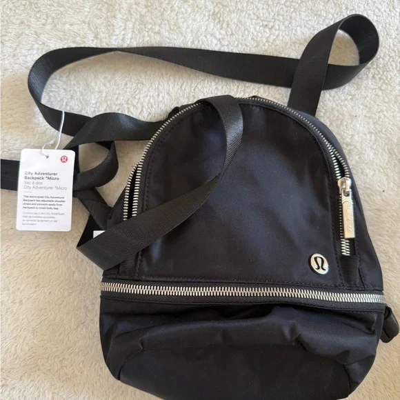 lululemon athletica | Bags | Lululemon Black Mini Backpack  display picture 1